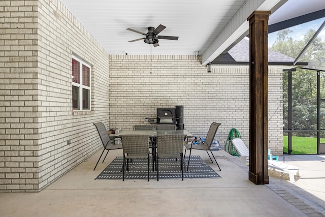 5881 Stacy Ln, Crestview, FL 32536 - view of patio featuring ceiling fan, a lanai, and outdoor dining area