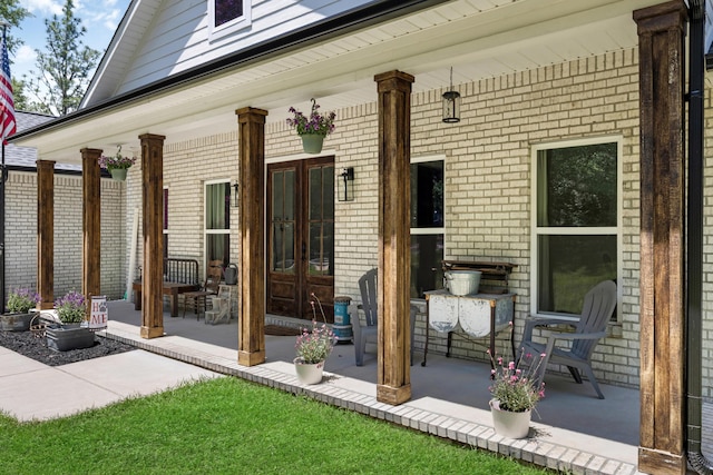 5881 Stacy Ln, Crestview, FL 32536 - covered porch featuring french doors