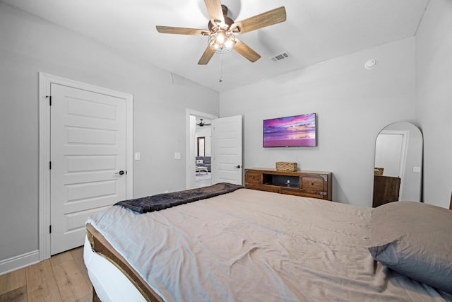 5881 Stacy Ln, Crestview, FL 32536 - bedroom with light wood finished floors, ceiling fan, and baseboards