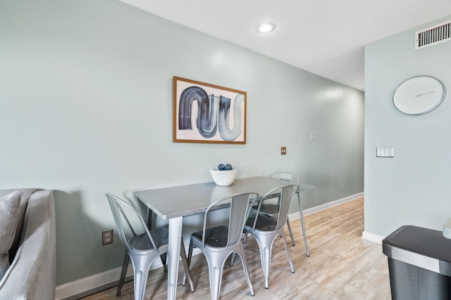8294 E County Highway 30a Unit 1, Alys Beach, FL 32461 - dining space with light wood finished floors, baseboards, and recessed lighting