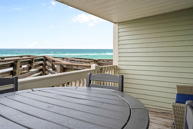 8294 E County Highway 30a Unit 1, Alys Beach, FL 32461 - balcony featuring a view of the beach, outdoor dining area, and a deck with water view