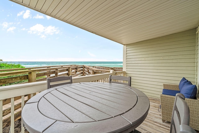 8294 E County Highway 30a Unit 1, Alys Beach, FL 32461 - balcony with outdoor dining space and a deck with water view