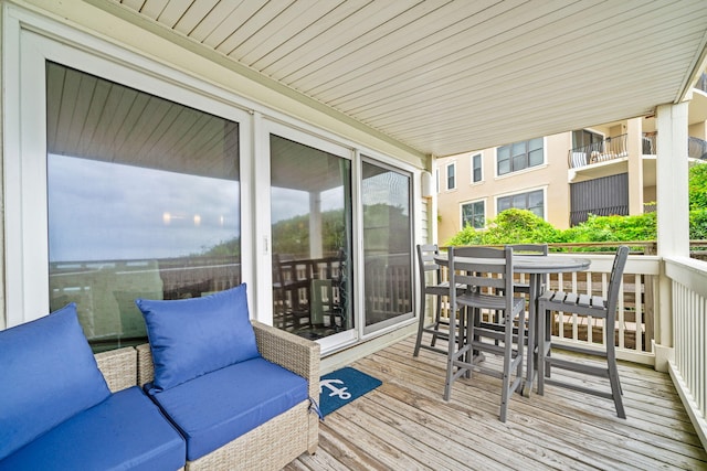 8294 E County Highway 30a Unit 1, Alys Beach, FL 32461 - sunroom featuring outdoor lounge area