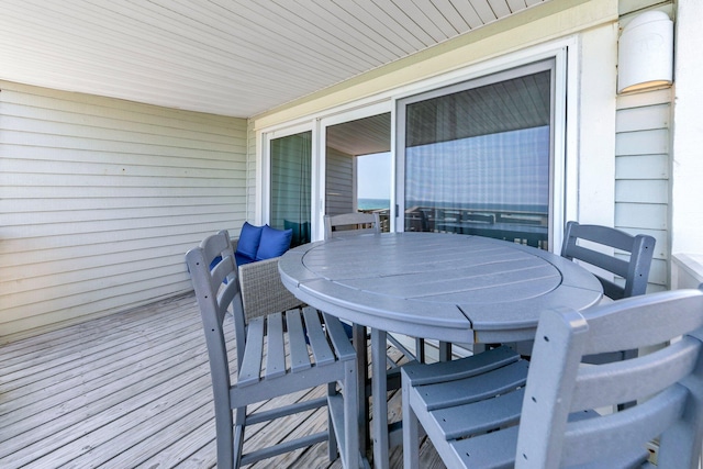8294 E County Highway 30a Unit 1, Alys Beach, FL 32461 - wooden deck featuring outdoor dining space