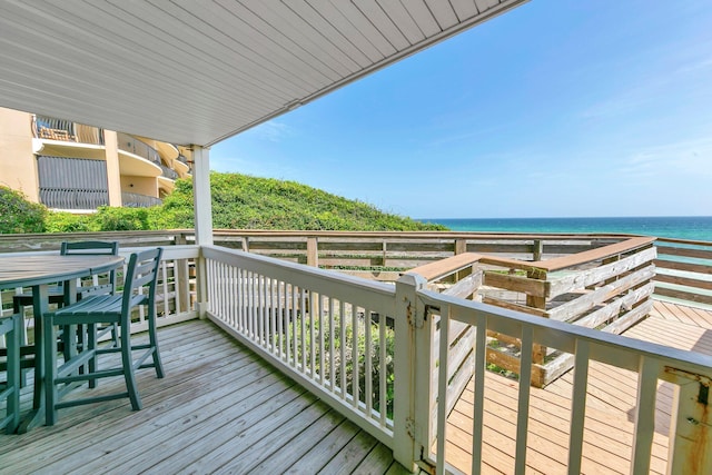 8294 E County Highway 30a Unit 1, Alys Beach, FL 32461 - wooden terrace featuring a water view