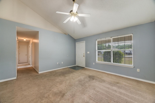 15 Flora Cv, Crestview, FL 32539 - carpeted spare room featuring vaulted ceiling, a ceiling fan, and baseboards