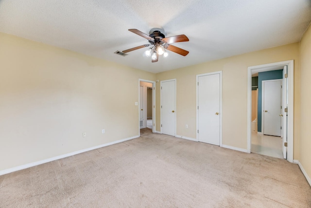 15 Flora Cv, Crestview, FL 32539 - unfurnished bedroom with carpet flooring, baseboards, and a ceiling fan
