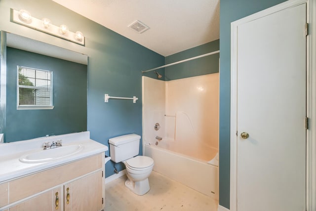 15 Flora Cv, Crestview, FL 32539 - bathroom with vanity, toilet, baseboards, and bathtub / shower combination