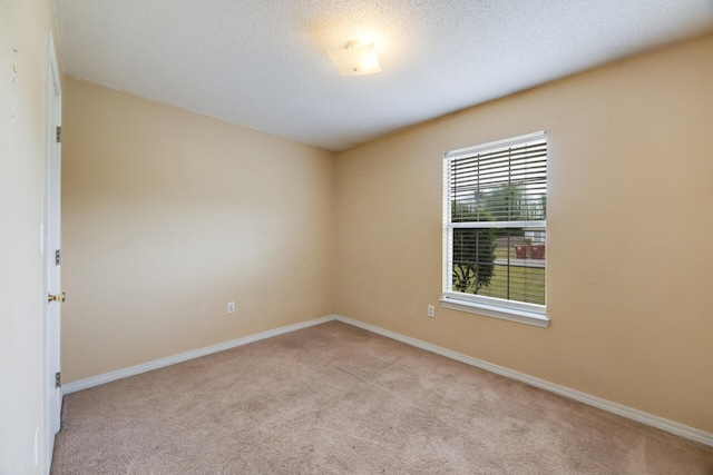 15 Flora Cv, Crestview, FL 32539 - carpeted empty room featuring baseboards and a textured ceiling