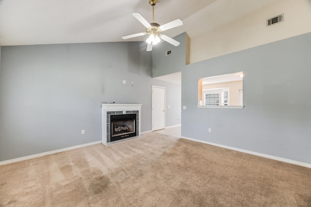 15 Flora Cv, Crestview, FL 32539 - unfurnished living room featuring high vaulted ceiling, a ceiling fan, carpet floors, baseboards, and a fireplace