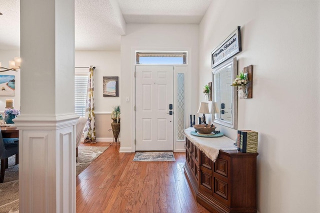 4475 New Market Rd, Niceville, FL 32578 - foyer entrance featuring light wood finished floors and baseboards