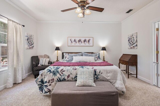 4475 New Market Rd, Niceville, FL 32578 - bedroom featuring carpet flooring, crown molding, baseboards, a ceiling fan, and a textured ceiling