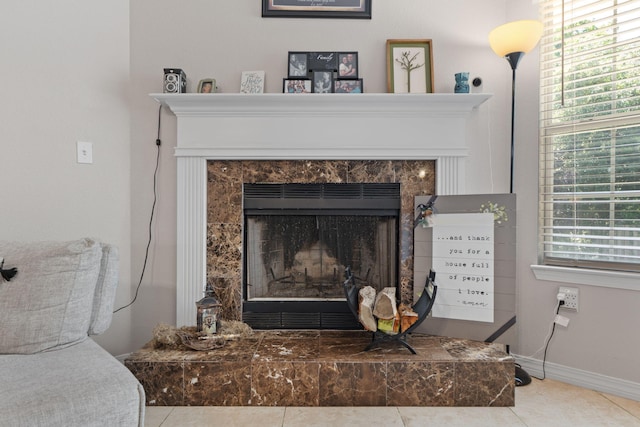 detailed view of a fireplace and baseboards
