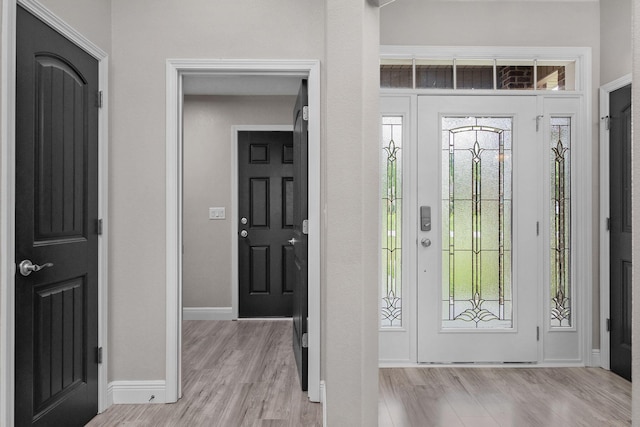 2354 Barberee Dr, Crestview, FL 32536 - foyer entrance with light wood-style floors, plenty of natural light, and baseboards