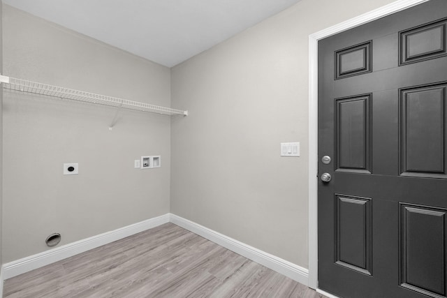 2354 Barberee Dr, Crestview, FL 32536 - laundry area with electric dryer hookup, washer hookup, light wood-type flooring, and baseboards
