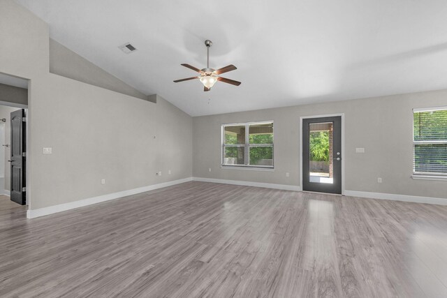 2354 Barberee Dr, Crestview, FL 32536 - unfurnished living room featuring ceiling fan, light wood-style floors, lofted ceiling, and baseboards