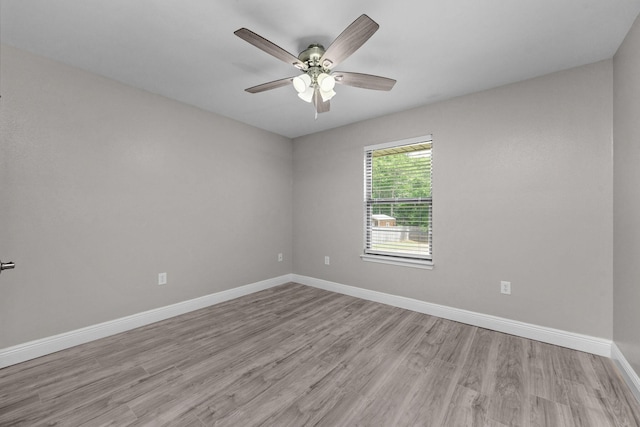 2354 Barberee Dr, Crestview, FL 32536 - spare room featuring light wood finished floors, baseboards, and ceiling fan