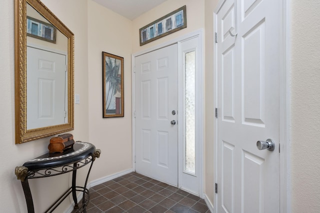 775 Gulf Shore Dr Unit 9222, Destin, FL 32541 - foyer entrance featuring baseboards and dark tile patterned flooring