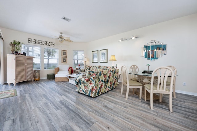 775 Gulf Shore Dr Unit 9222, Destin, FL 32541 - living room with wood finished floors, a ceiling fan, and baseboards