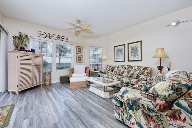 775 Gulf Shore Dr Unit 9222, Destin, FL 32541 - living room featuring wood finished floors, a ceiling fan, and baseboards