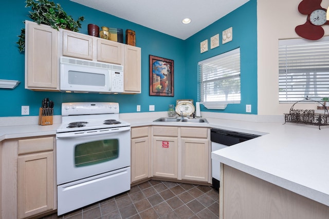 775 Gulf Shore Dr Unit 9222, Destin, FL 32541 - kitchen featuring white appliances, dark tile patterned floors, light countertops, recessed lighting, and a sink