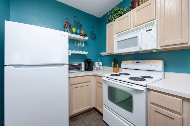 775 Gulf Shore Dr Unit 9222, Destin, FL 32541 - kitchen featuring white appliances, light countertops, and light brown cabinetry