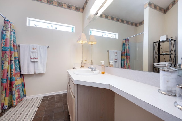 775 Gulf Shore Dr Unit 9222, Destin, FL 32541 - full bathroom with vanity, curtained shower, and baseboards