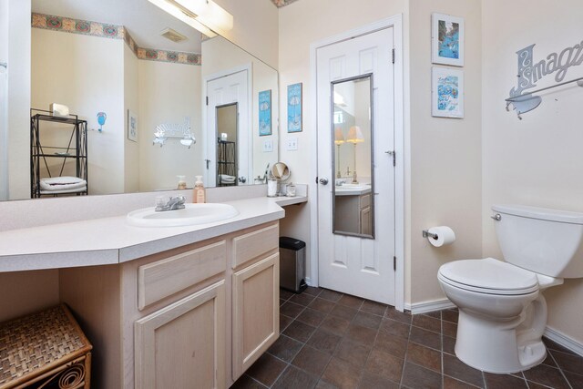 775 Gulf Shore Dr Unit 9222, Destin, FL 32541 - bathroom with toilet, vanity, and baseboards