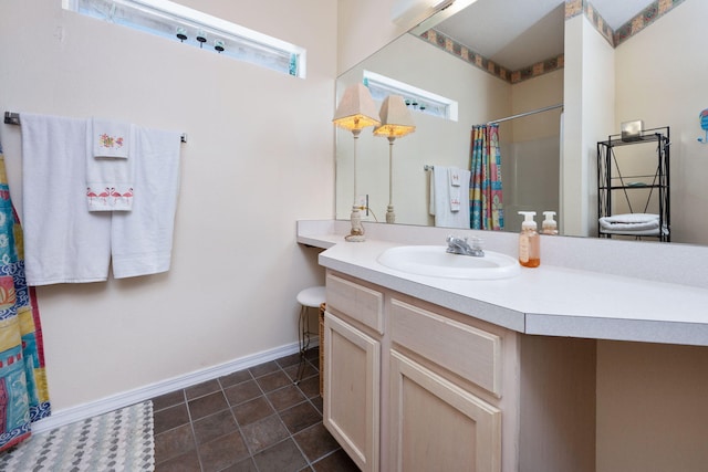 775 Gulf Shore Dr Unit 9222, Destin, FL 32541 - bathroom featuring vanity, curtained shower, baseboards, and tile patterned floors