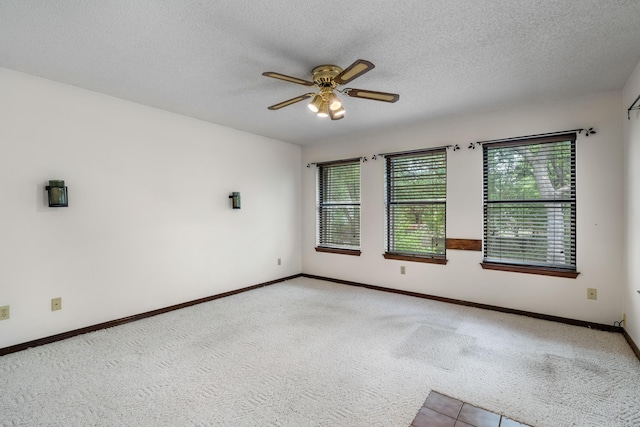 102 Bermuda Way, Niceville, FL 32578 - spare room featuring ceiling fan, carpet flooring, a textured ceiling, and baseboards