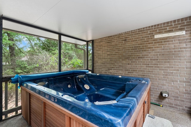 102 Bermuda Way, Niceville, FL 32578 - sunroom featuring a jacuzzi and healthy amount of natural light