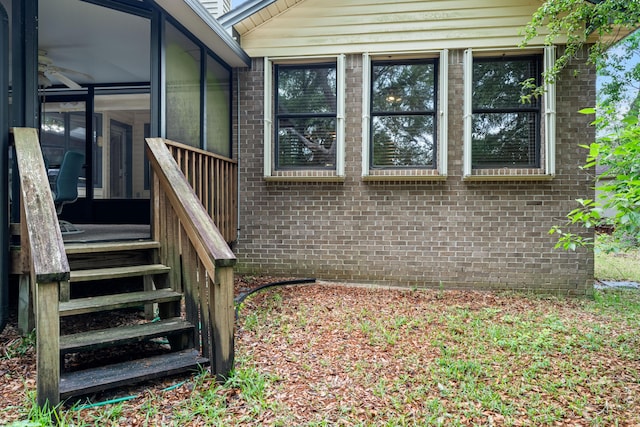 102 Bermuda Way, Niceville, FL 32578 - view of property exterior featuring brick siding and stairway
