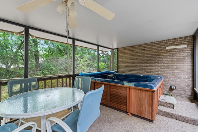 102 Bermuda Way, Niceville, FL 32578 - sunroom featuring a jacuzzi, a ceiling fan, plenty of natural light, and outdoor dining area