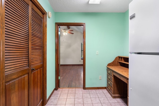 102 Bermuda Way, Niceville, FL 32578 - bathroom with a textured ceiling, baseboards, ceiling fan, and tile patterned floors