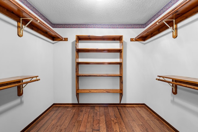 102 Bermuda Way, Niceville, FL 32578 - walk in closet featuring wood finished floors