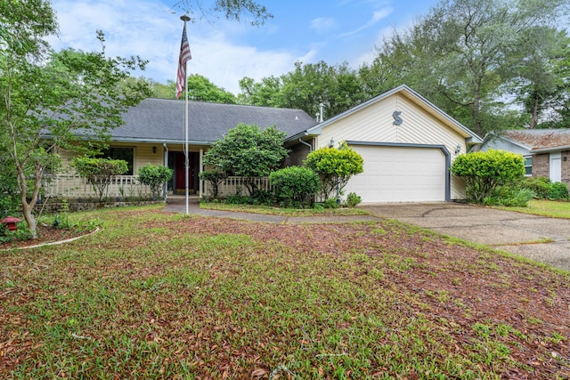 102 Bermuda Way, Niceville, FL 32578 - single story home with asphalt driveway and a garage