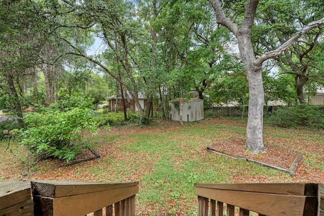 102 Bermuda Way, Niceville, FL 32578 - view of yard with a shed, an outbuilding, and fence