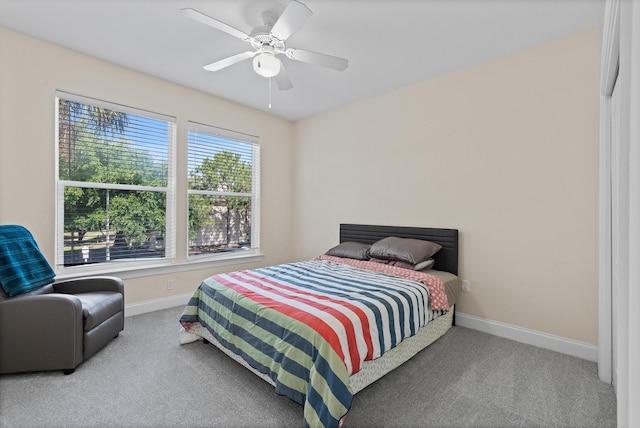 251 Mattie M Kelly Blvd Unit 203, Destin, FL 32541 - bedroom featuring baseboards, carpet flooring, and ceiling fan