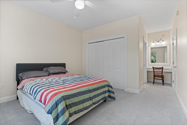 251 Mattie M Kelly Blvd Unit 203, Destin, FL 32541 - carpeted bedroom featuring a closet, baseboards, and a ceiling fan