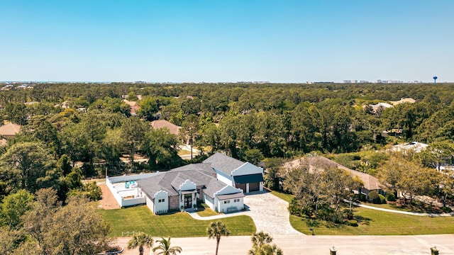 view from above of property with a forest