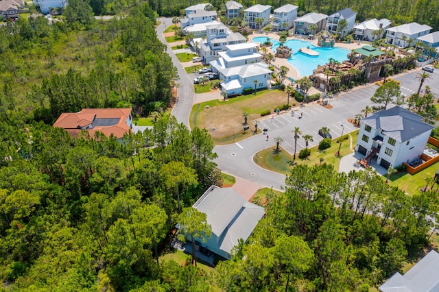 aerial view of residential area featuring a pool area