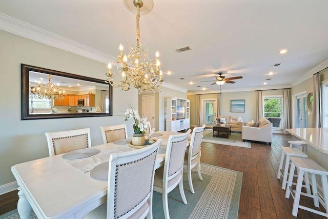 dining space featuring ornamental molding, recessed lighting, a chandelier, dark wood-type flooring, and ceiling fan