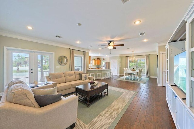 living room featuring ornamental molding, a ceiling fan, french doors, recessed lighting, and dark wood-style flooring