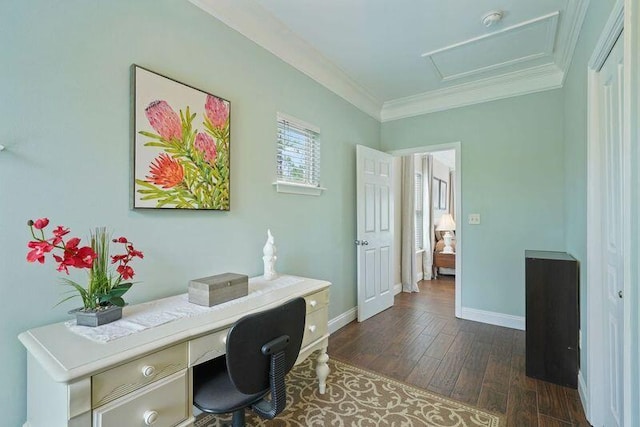 office space with ornamental molding, dark wood finished floors, baseboards, and attic access