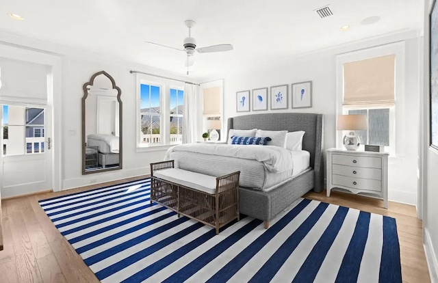 17 Compass Point Way, Watersound, FL 32461 - bedroom with wood-type flooring, recessed lighting, and a ceiling fan
