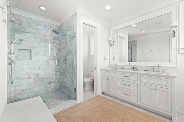 17 Compass Point Way, Watersound, FL 32461 - full bath featuring a shower stall, recessed lighting, toilet, double vanity, and tile patterned floors
