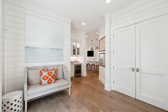 17 Compass Point Way, Watersound, FL 32461 - living area featuring wine cooler, wood finished floors, and recessed lighting