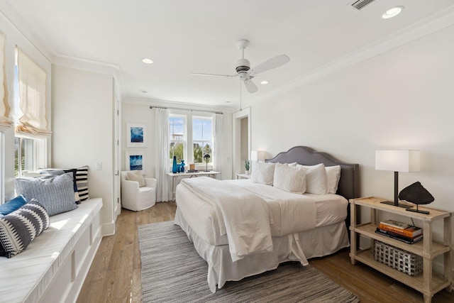 17 Compass Point Way, Watersound, FL 32461 - bedroom with crown molding, wood finished floors, recessed lighting, and a ceiling fan