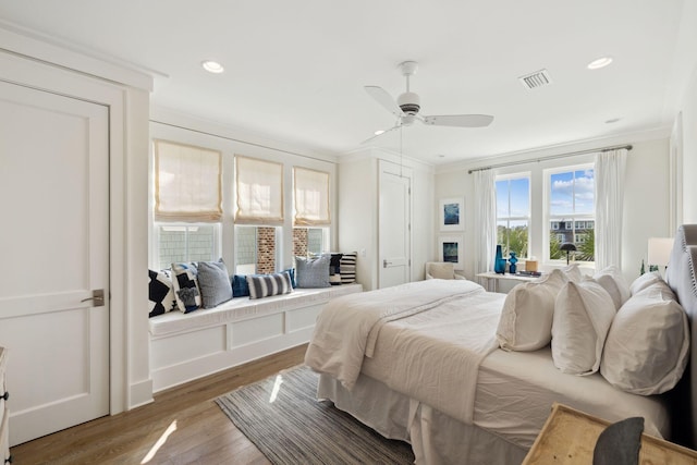 17 Compass Point Way, Watersound, FL 32461 - bedroom with crown molding, wood finished floors, a ceiling fan, and recessed lighting
