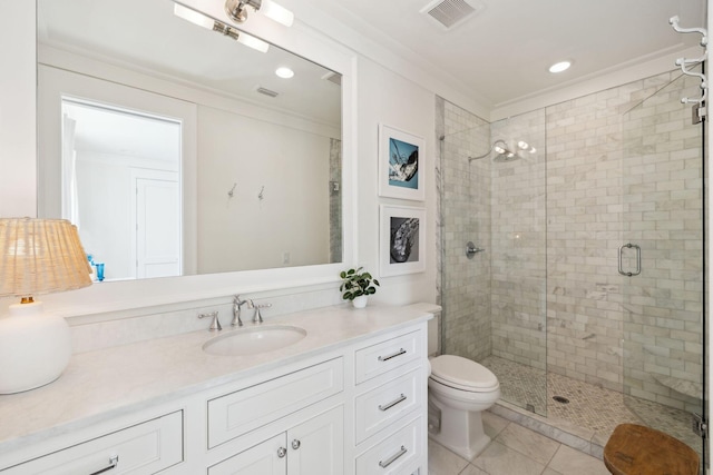 17 Compass Point Way, Watersound, FL 32461 - full bathroom with crown molding, a stall shower, toilet, tile patterned floors, and vanity